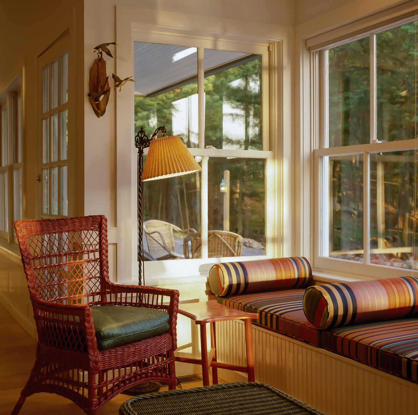 A nook with windows to the outdoors.