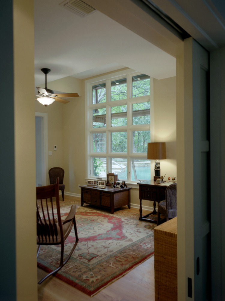 Widows and furniture of a living room.