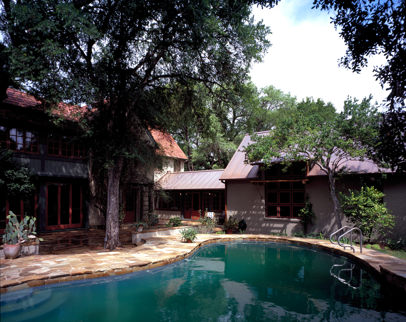 A pool's view of it's house.